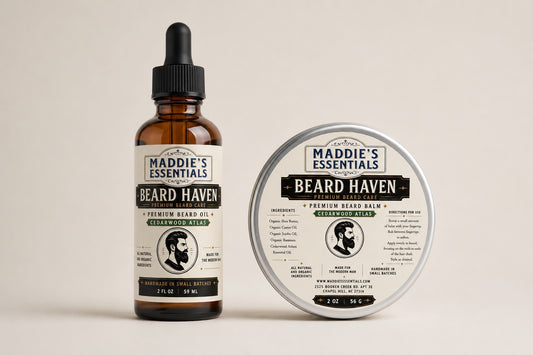 Maddie's Essentials Beard Haven grooming set with amber glass oil dropper bottle and metal balm tin, cedarwood scent.